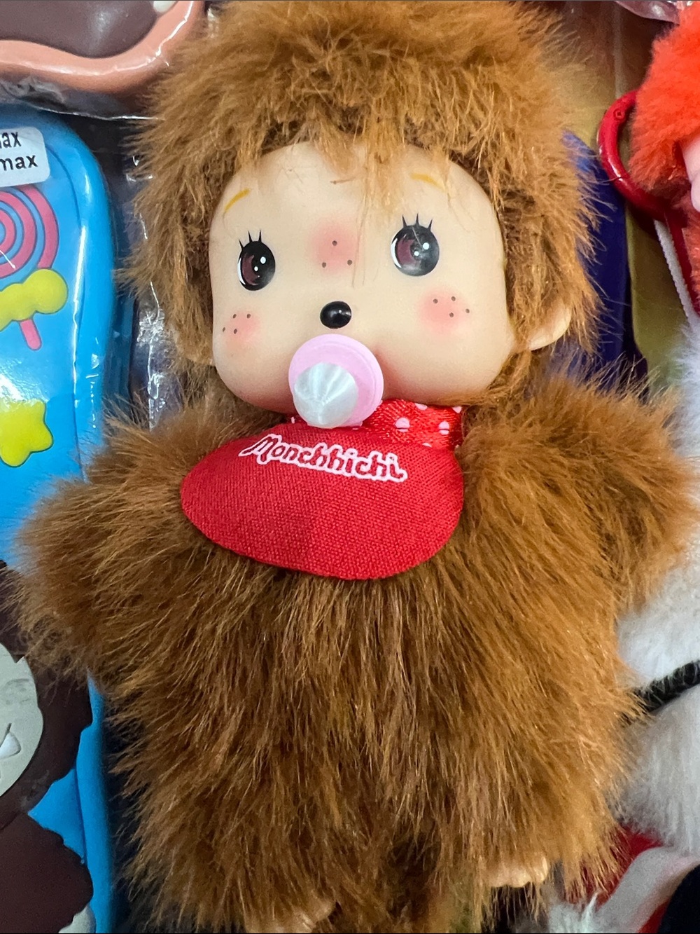 Brown Plush Baby Doll with Red Bib
